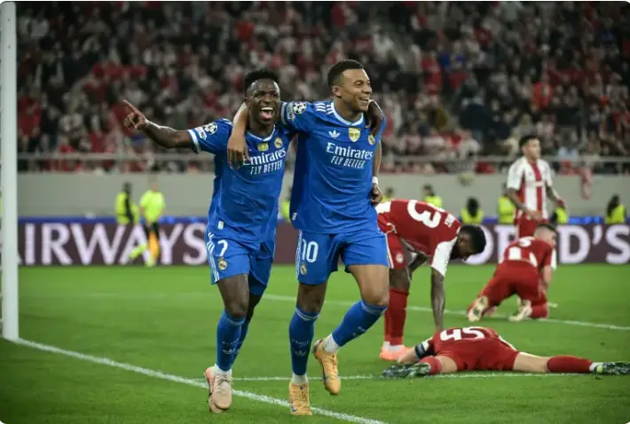 Scoreboard showing the 4-3 final score between Real Madrid and Olympiacos.